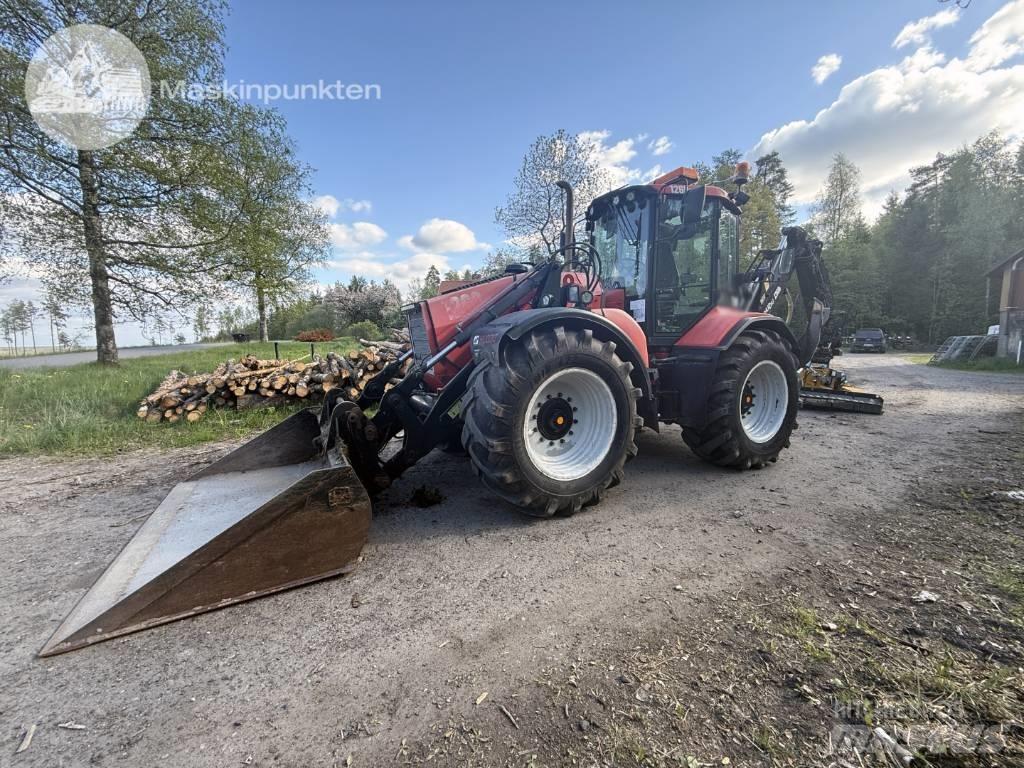 Huddig 1260 B Товарач със заден ексватор