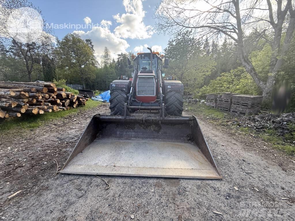 Huddig 1260 B Товарач със заден ексватор
