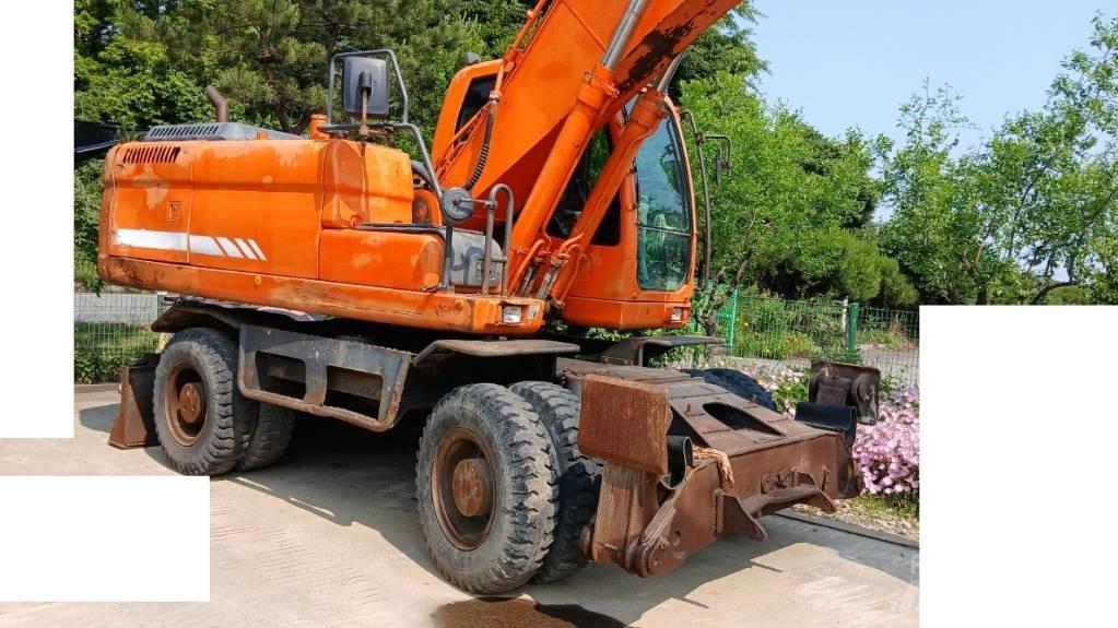 Doosan DX 210 W Колесни екскаватори