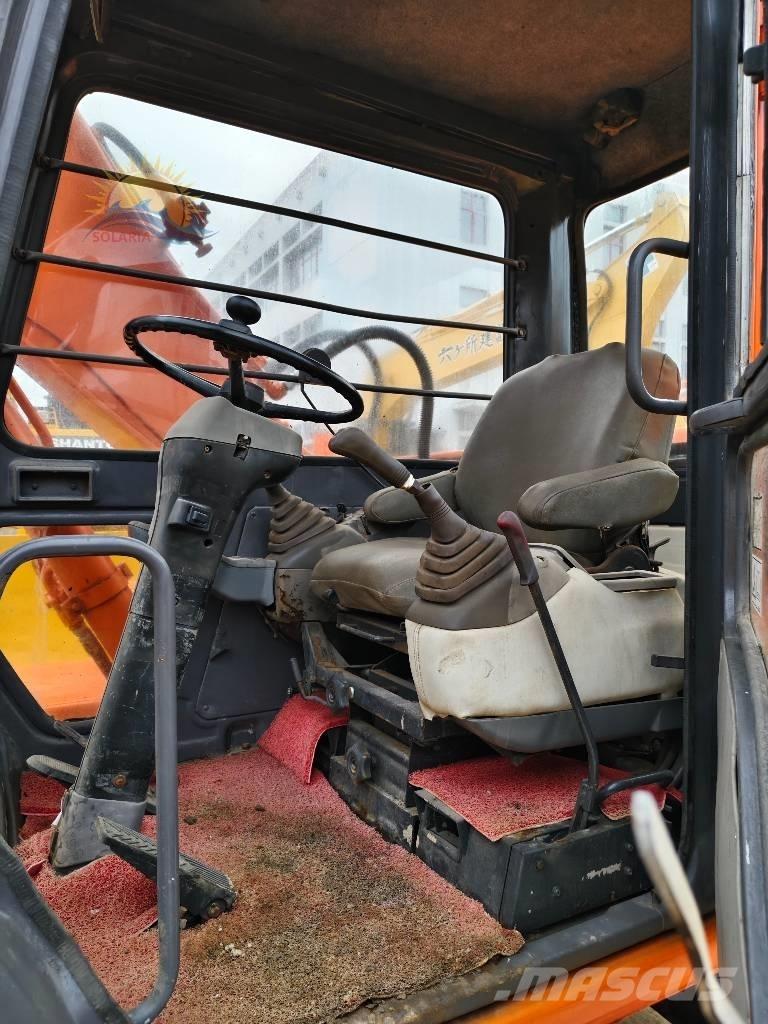Hitachi EX 100 W D Колесни екскаватори