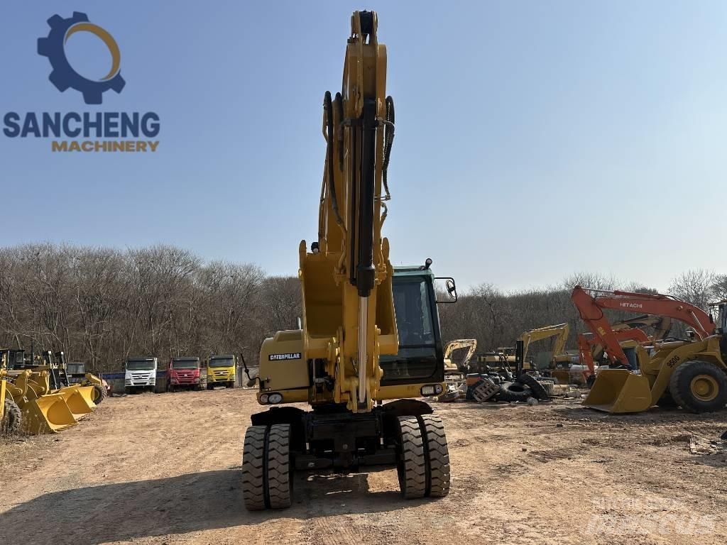 CAT M 320 D2 Колесни екскаватори