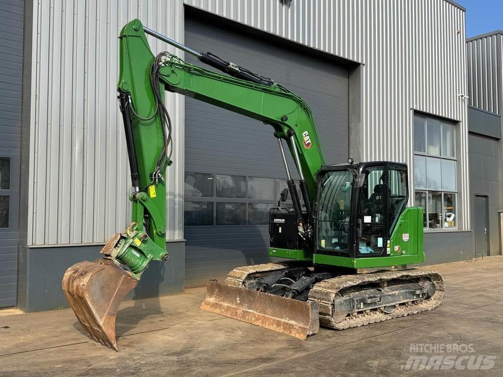 CAT 310 Средни екскаватори 7т - 12т