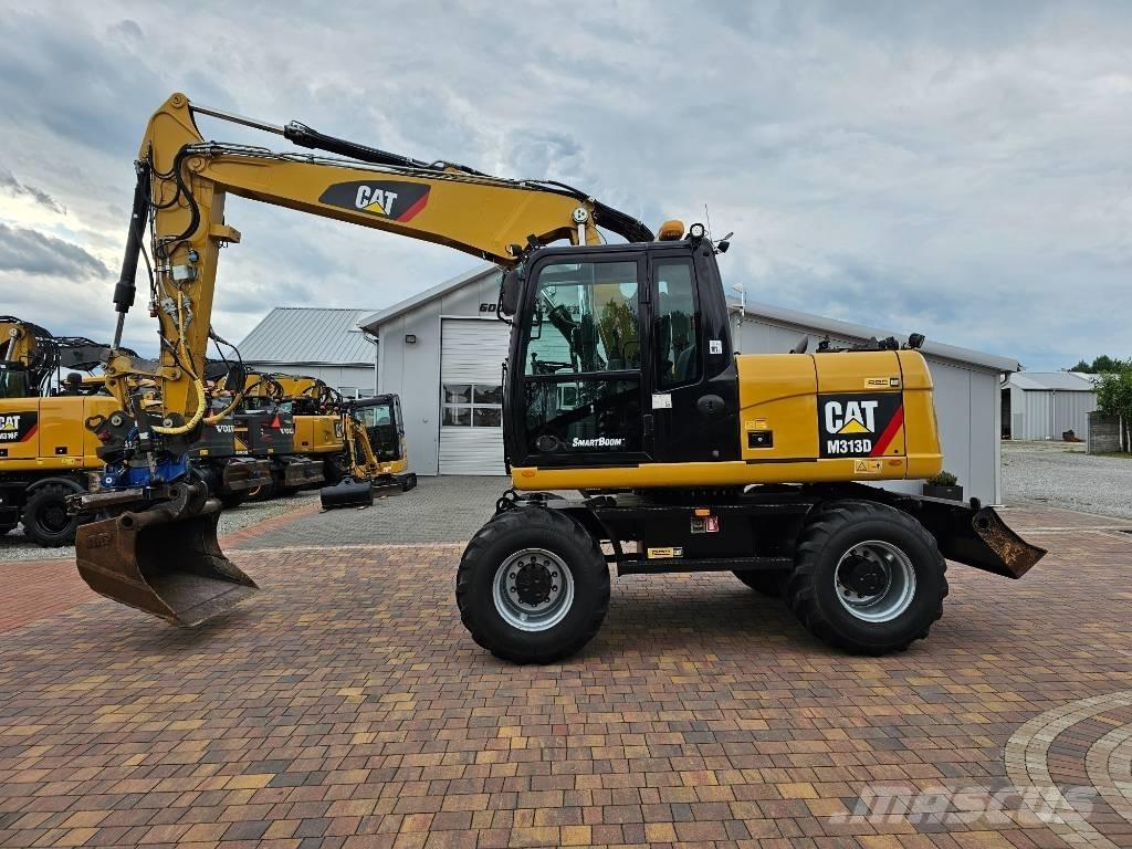 CAT M 313 D Колесни екскаватори