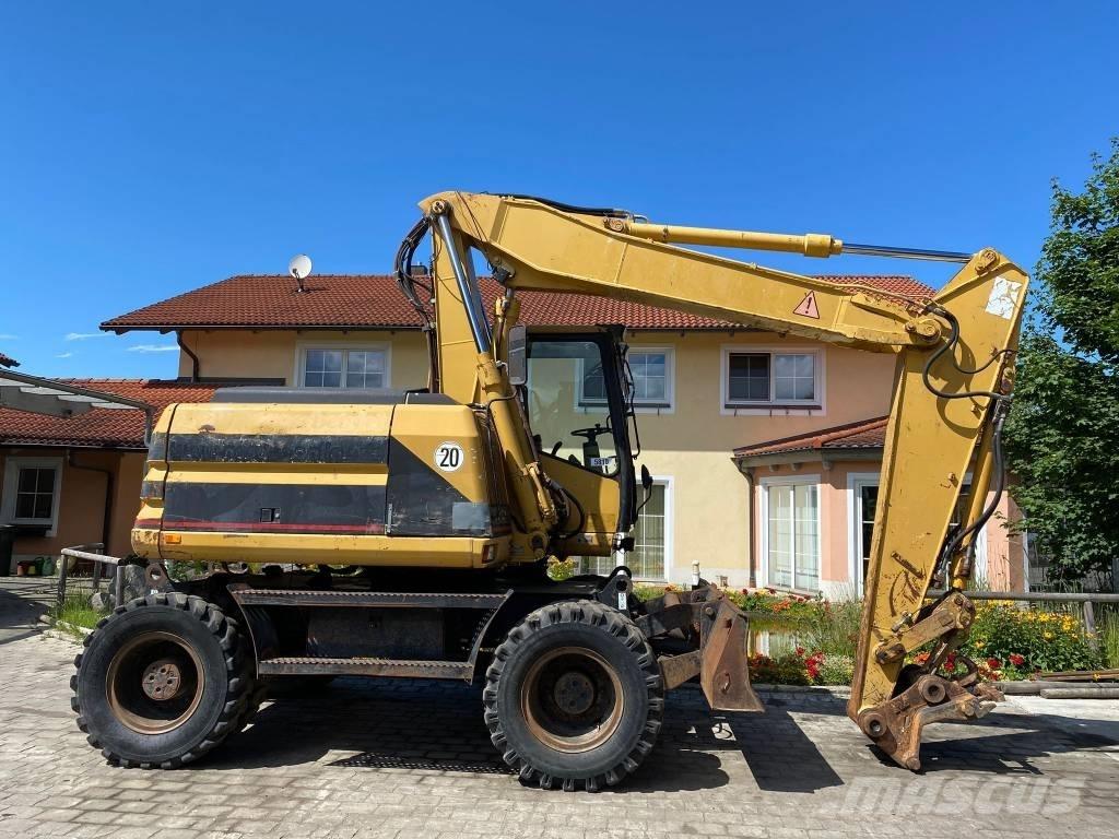 CAT M 312 Колесни екскаватори