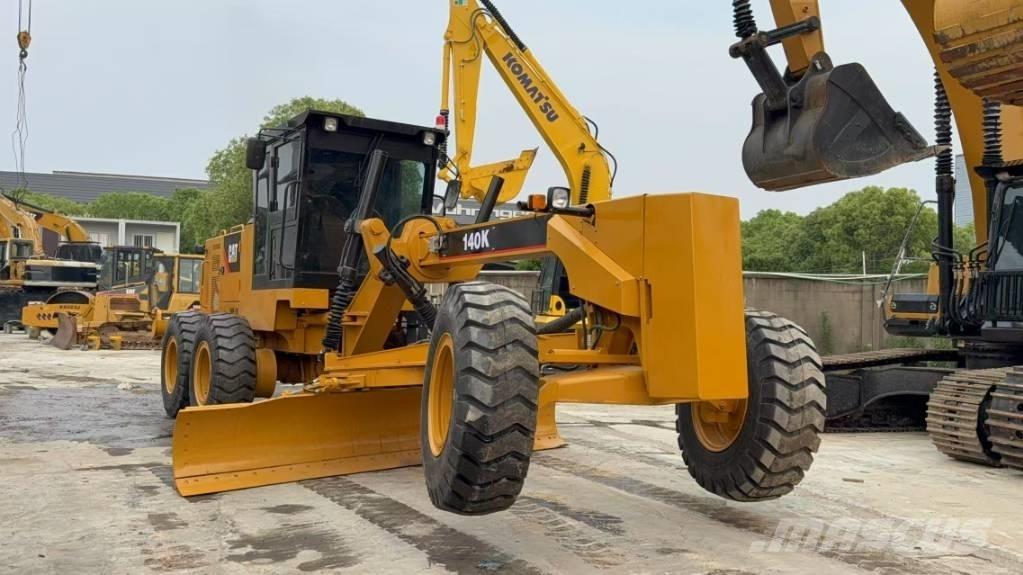 CAT 140K Грейдери