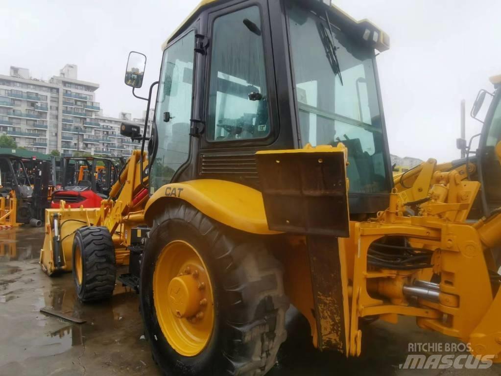 CAT 416f Товарач със заден ексватор
