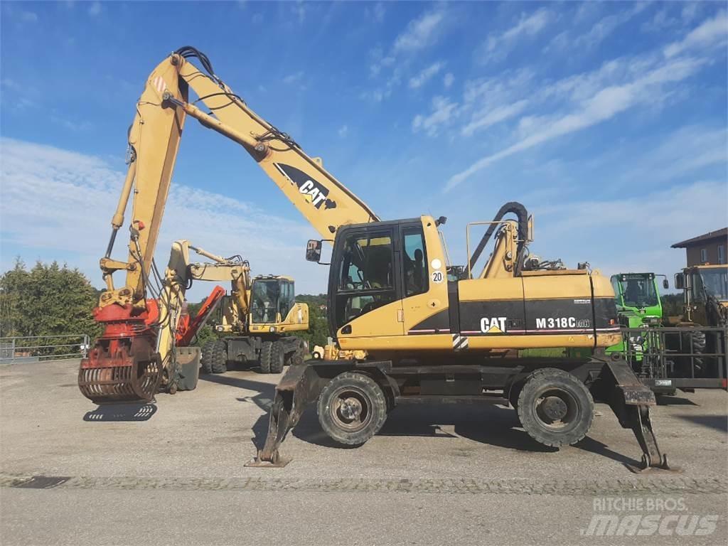 CAT M318C MH Колесни екскаватори