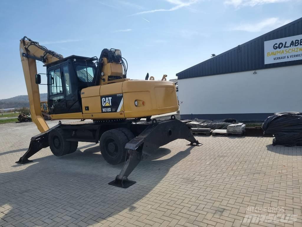 CAT 318D Оператори на отпадъци/индустрия

