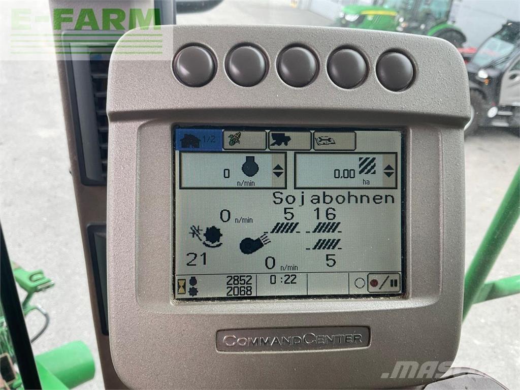 John Deere T560HM Комбайни