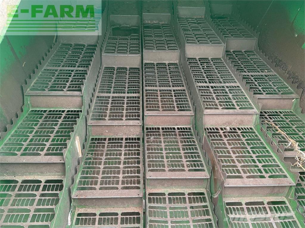 John Deere T560HM Комбайни