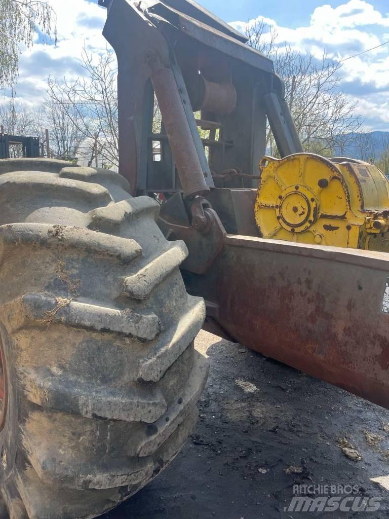 Timberjack 450C Скидери
