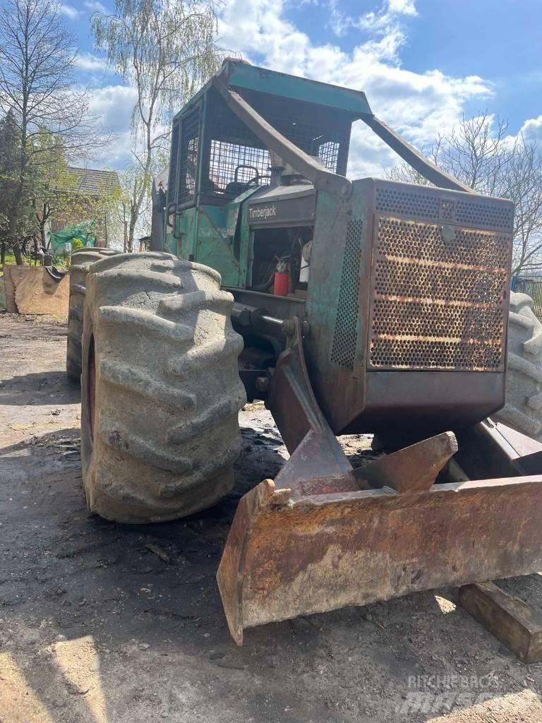 Timberjack 450C Скидери
