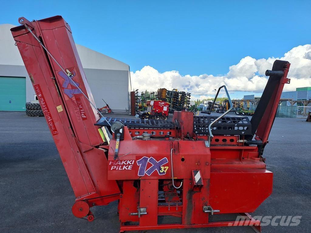 Hakki 1X Машини за цепене и рязане на дърва