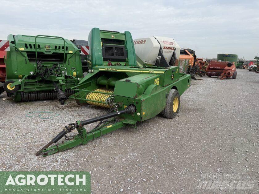 John Deere 359 Трактори