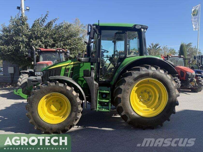 John Deere 6090M Трактори