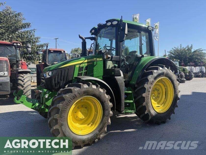 John Deere 6090M Трактори