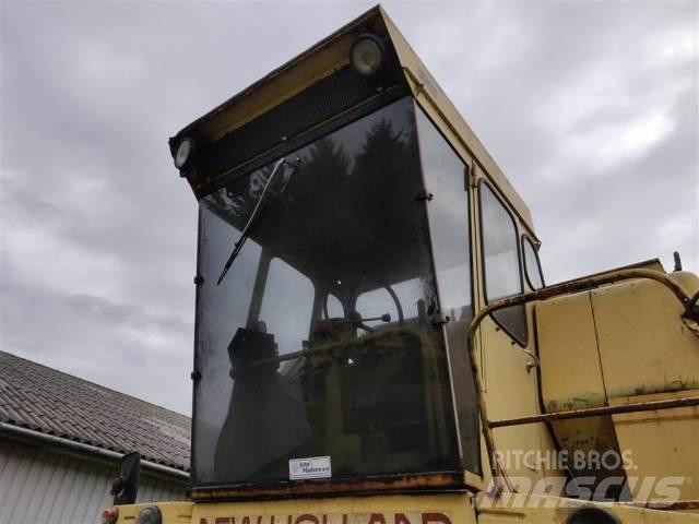 New Holland 1550 Кабина
