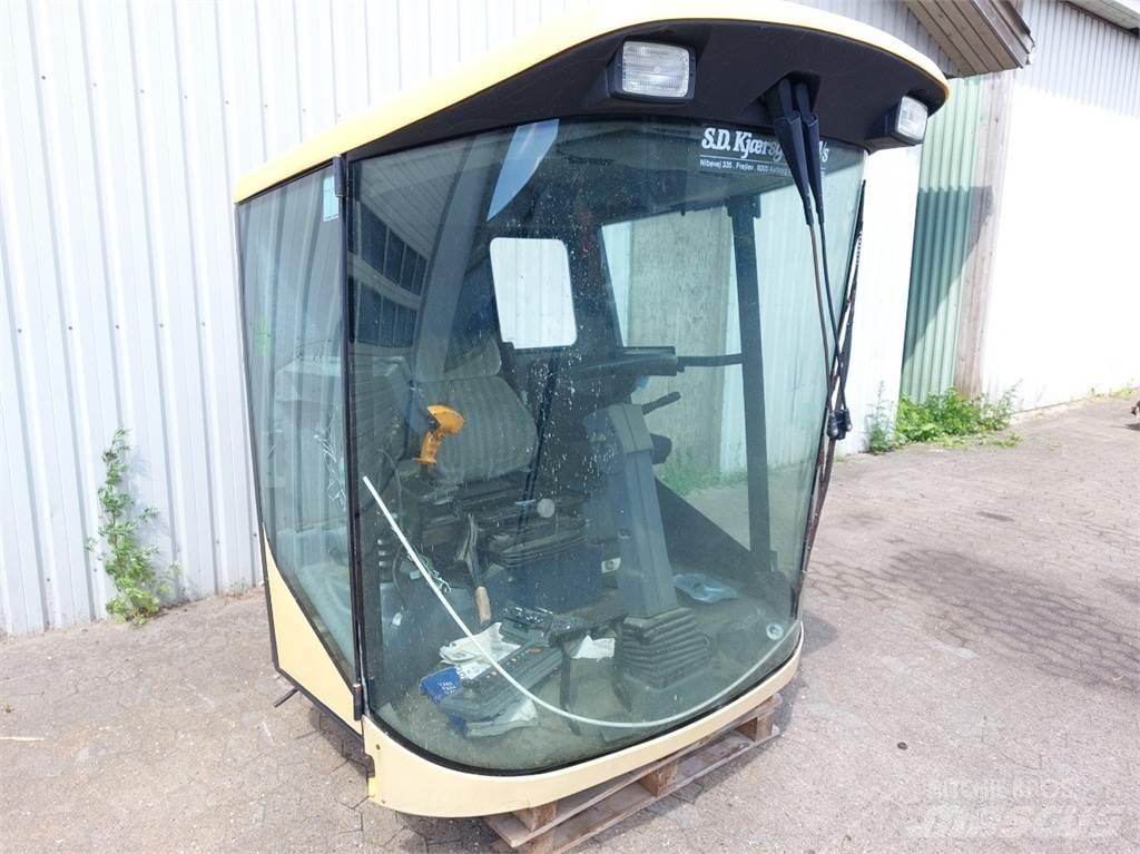 New Holland TX65 Кабина