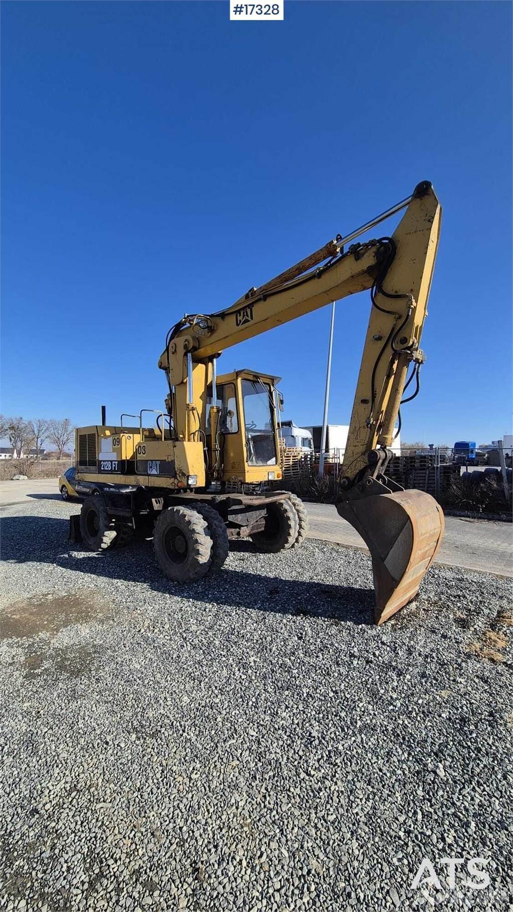 CAT 212BFT Колесни екскаватори