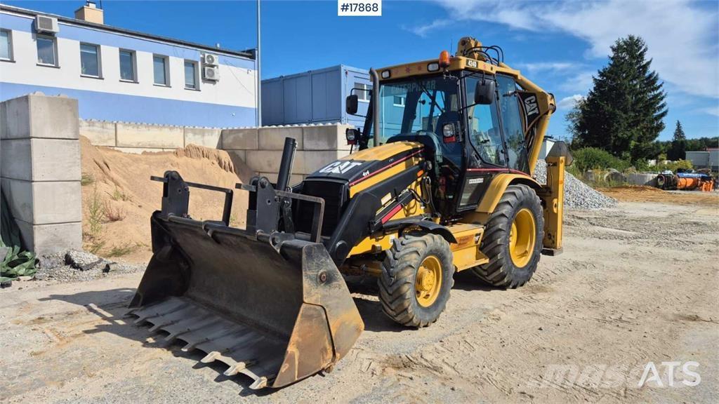 CAT 424D Товарач със заден ексватор