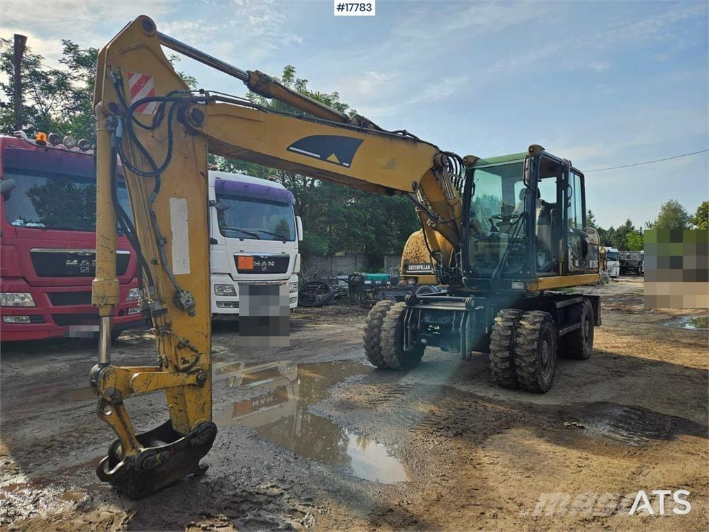 CAT M315C Колесни екскаватори