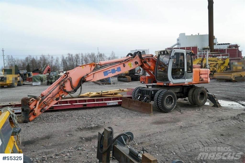 Hitachi EX165W Колесни екскаватори
