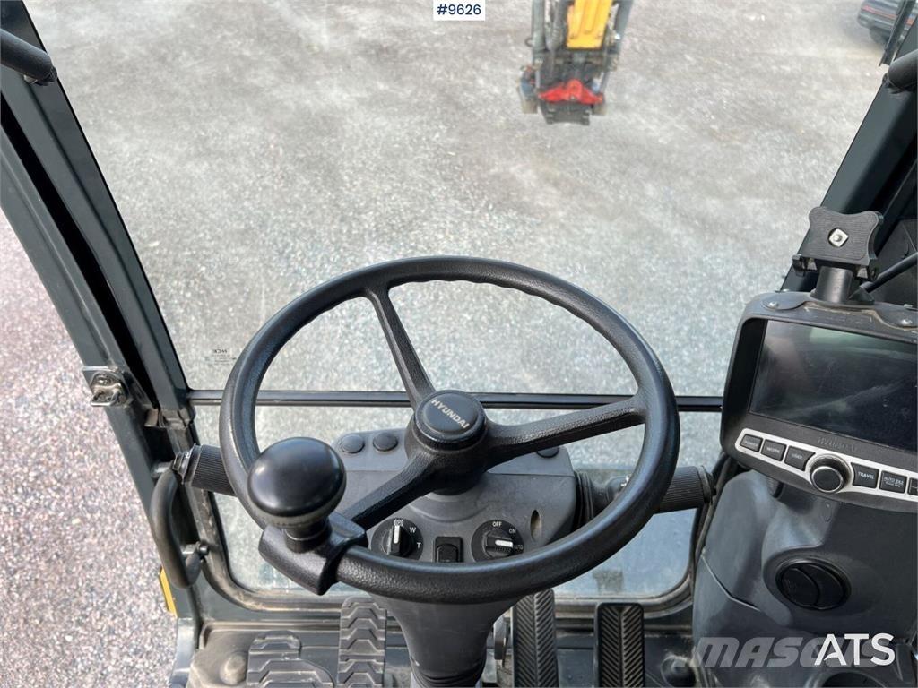Hyundai 140W-9A Колесни екскаватори