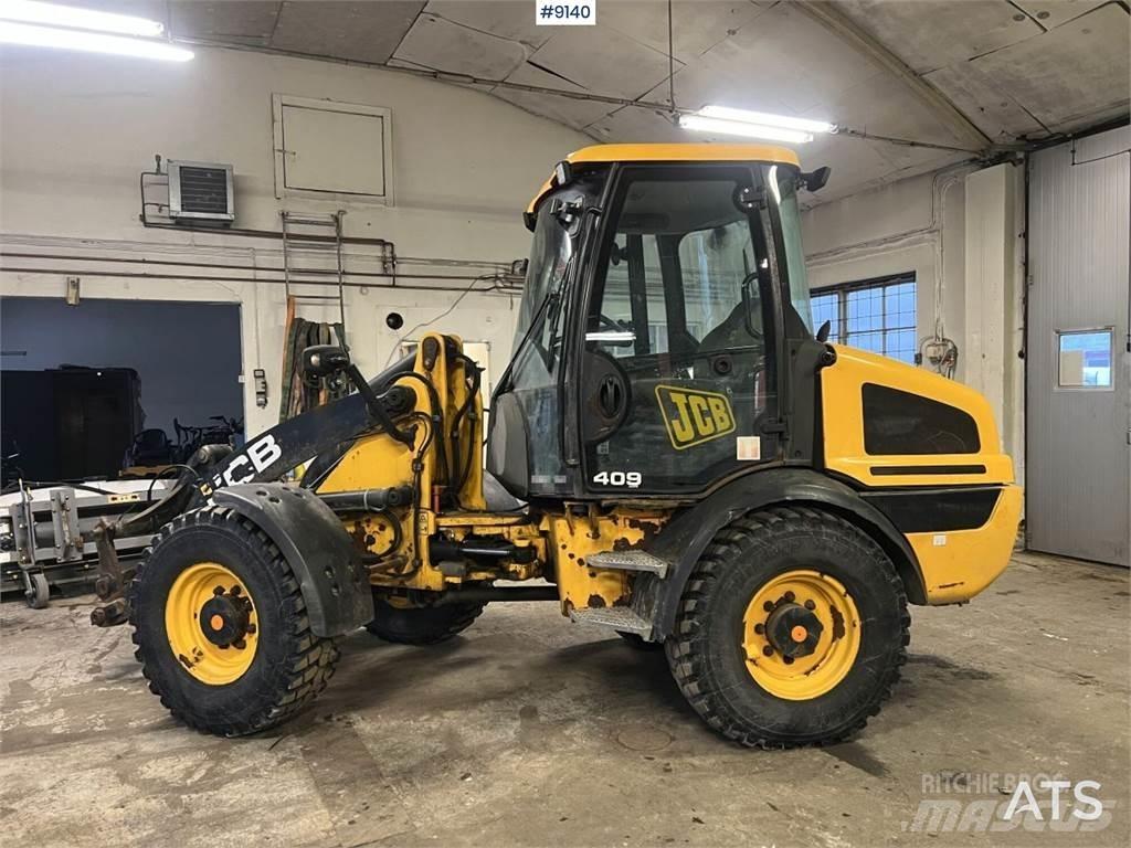 JCB 409 T4 Колесни булдозери
