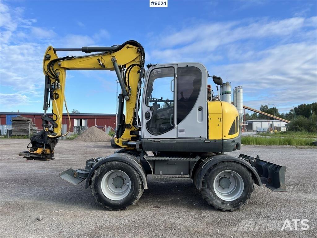 Wacker Neuson EW100 Средни екскаватори 7т - 12т