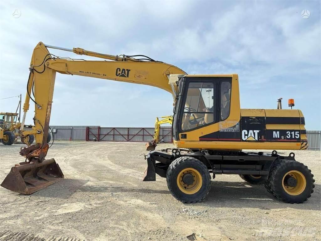 CAT M 315 Колесни екскаватори