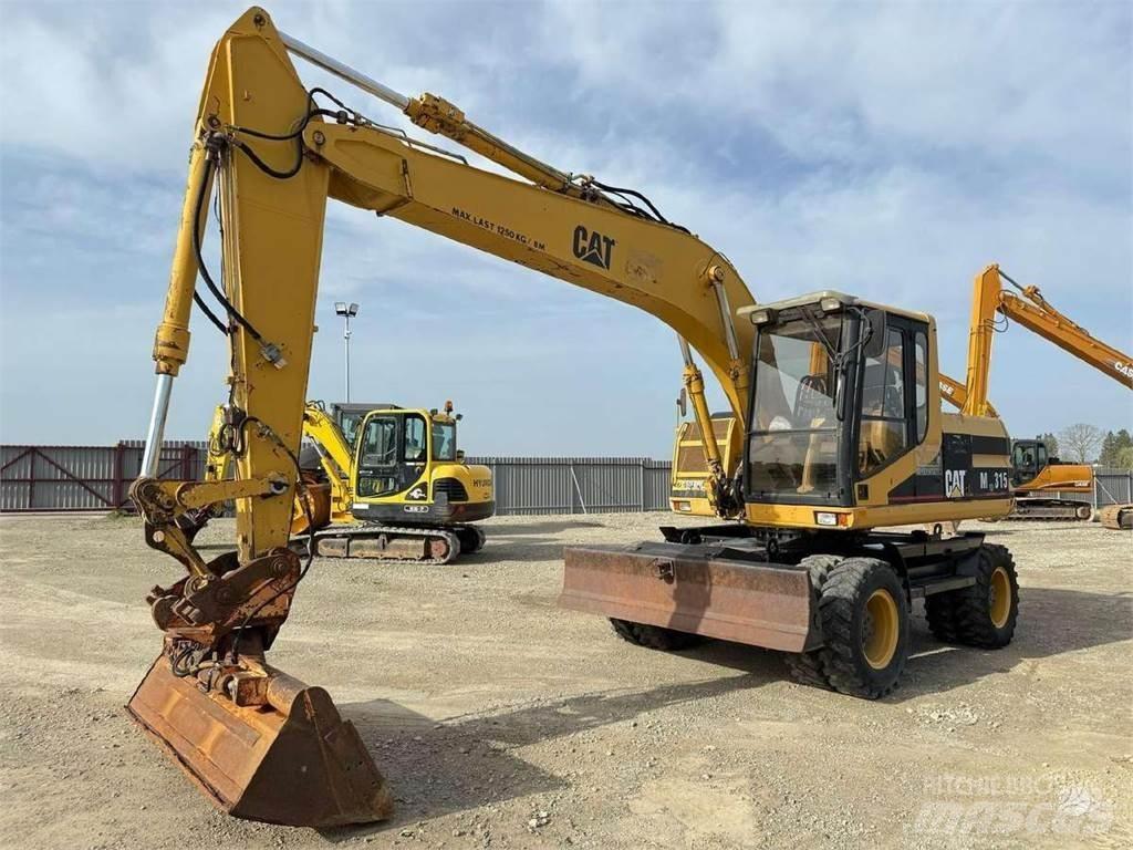 CAT M 315 Колесни екскаватори
