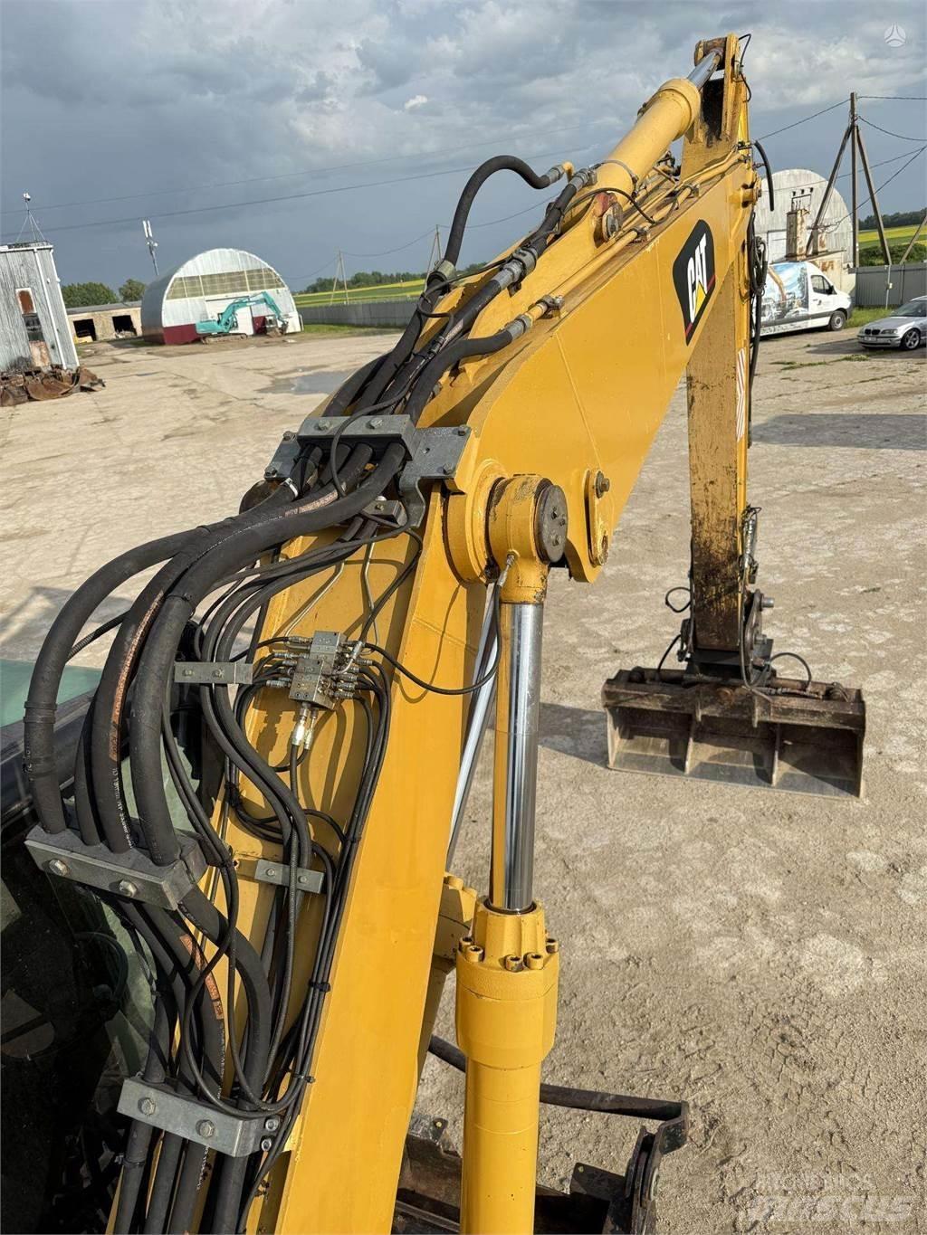 CAT M315C Колесни екскаватори