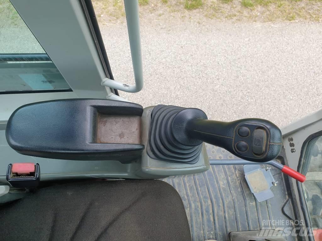 Takeuchi TB295W Колесни екскаватори