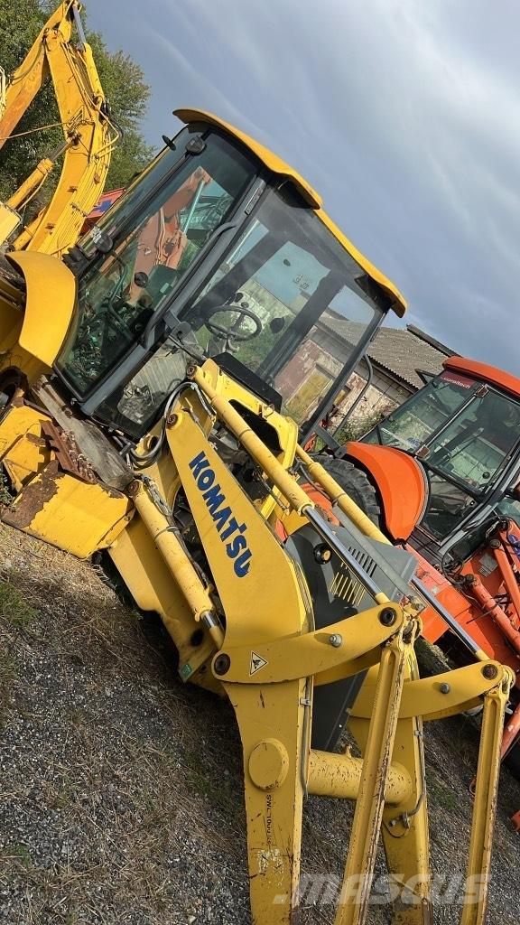Komatsu WB 93 R Оси
