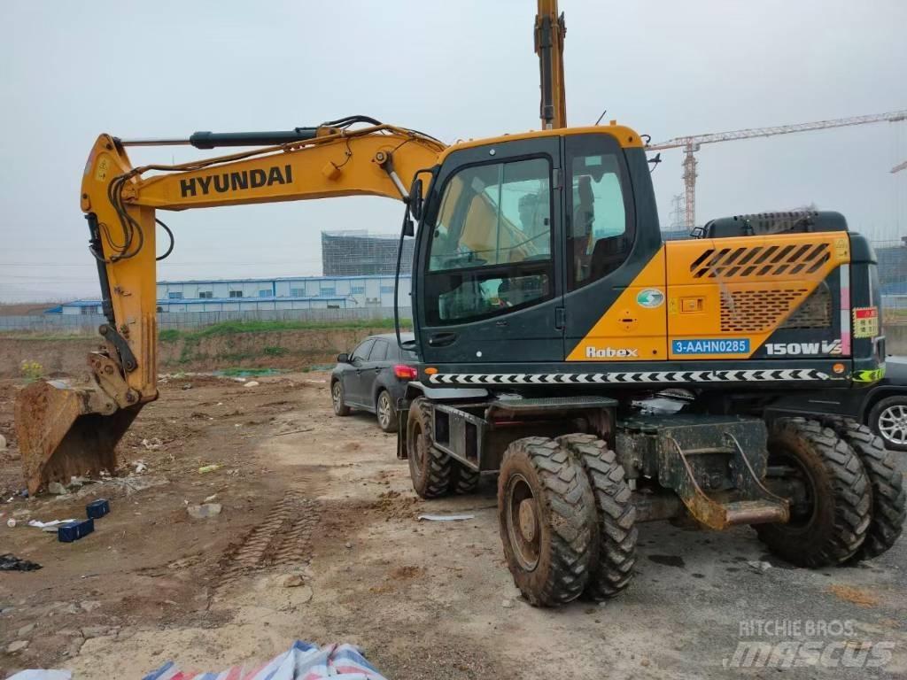 Hyundai 210W Колесни екскаватори