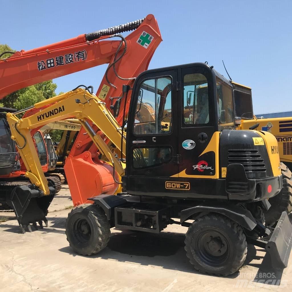 Hyundai 60 W Колесни екскаватори
