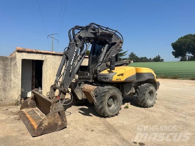 Mecalac 12 MTX Колесни екскаватори