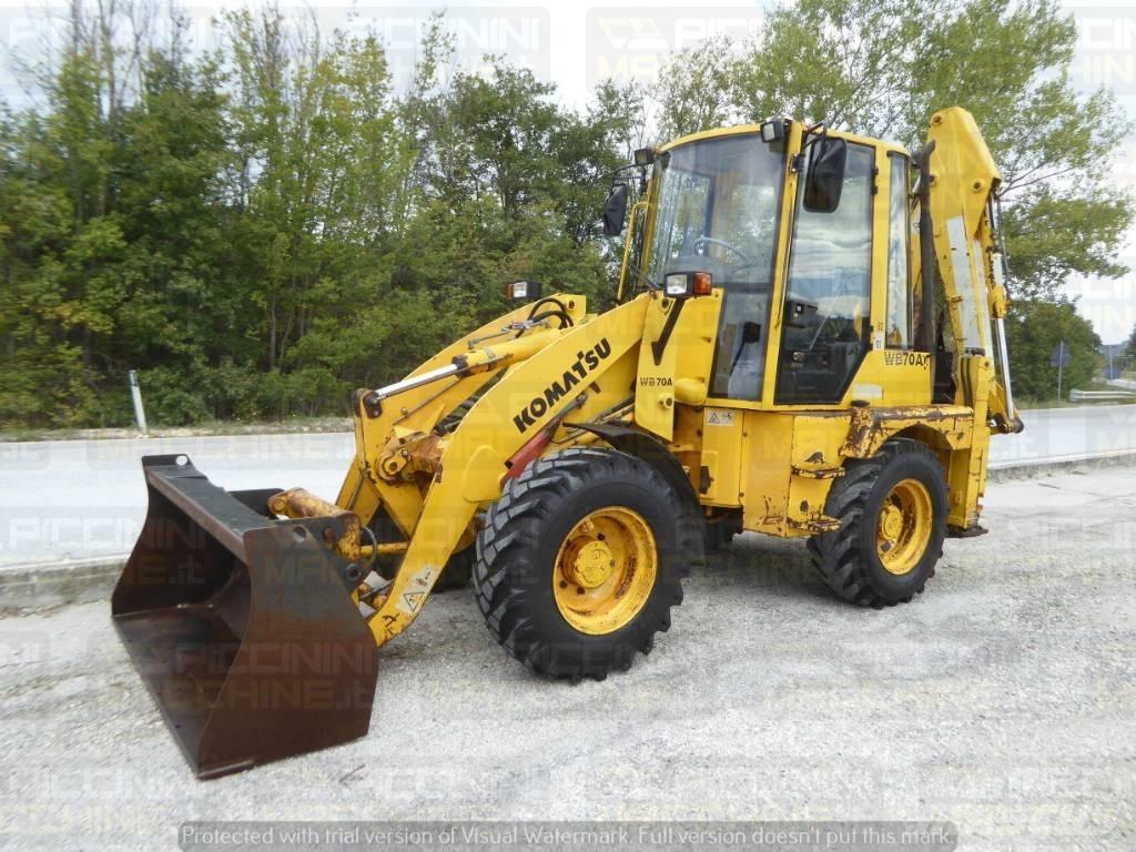 Komatsu WB70A Товарач със заден ексватор