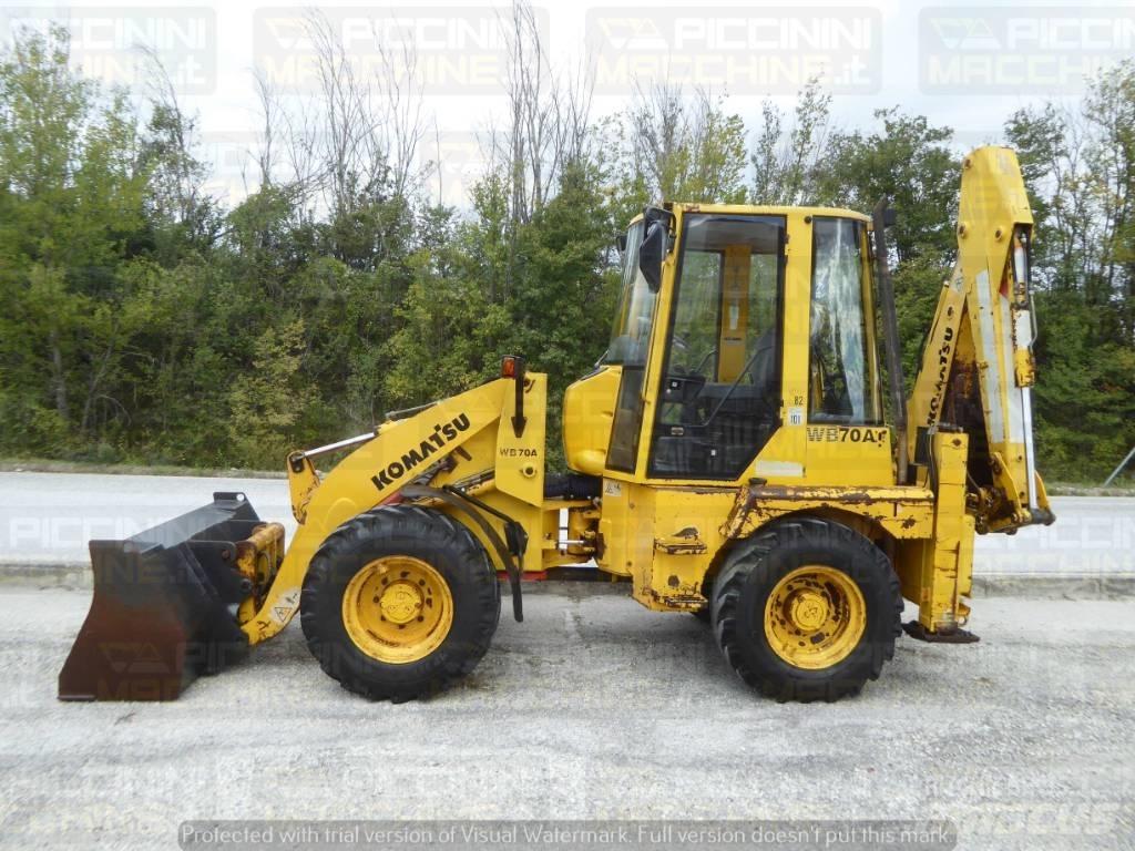 Komatsu WB70A Товарач със заден ексватор