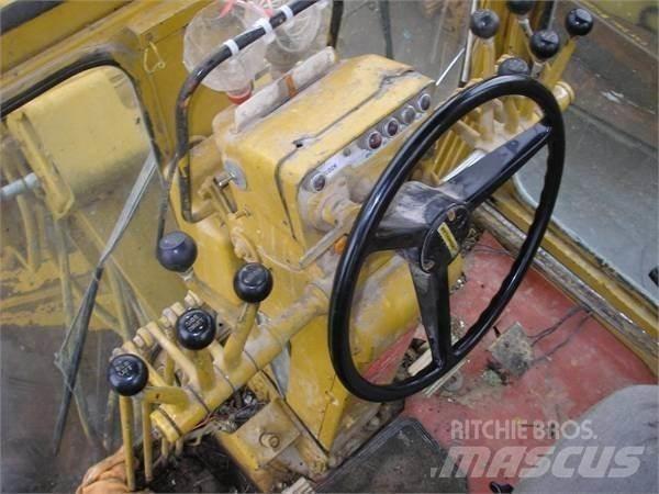 CAT 12G Грейдери