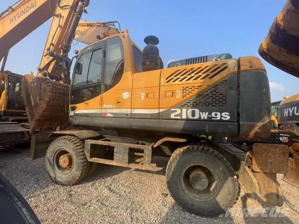 Hyundai 210W-9 Колесни екскаватори