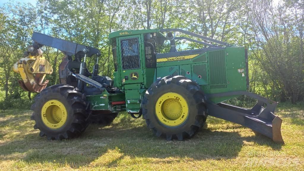 John Deere 648 L-II Скидери
