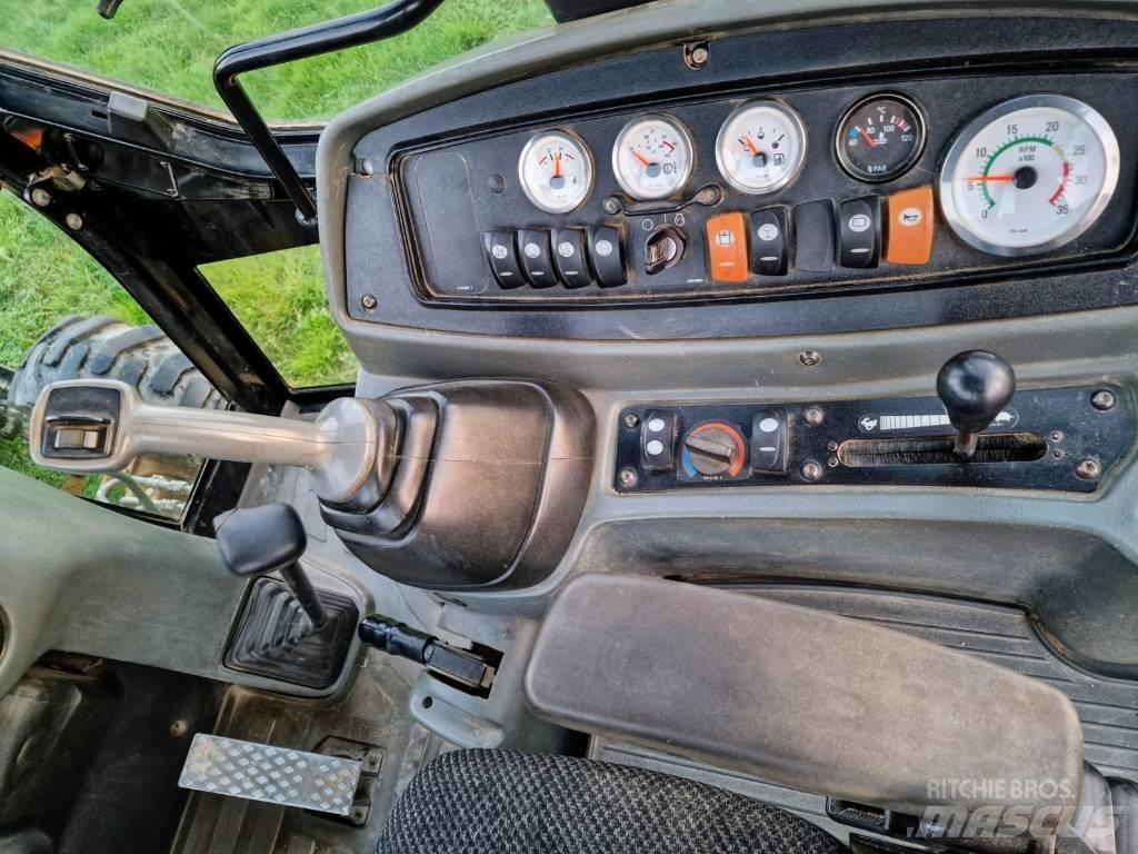 CAT 442 D Товарач със заден ексватор