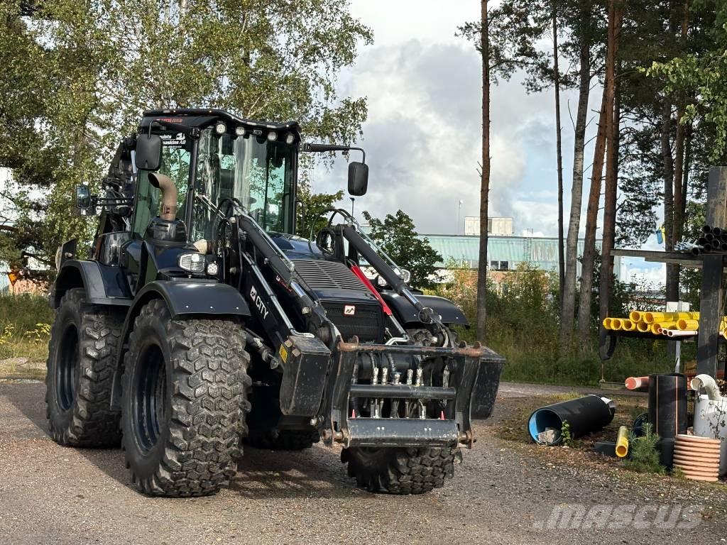 Huddig 1260 D Товарач със заден ексватор