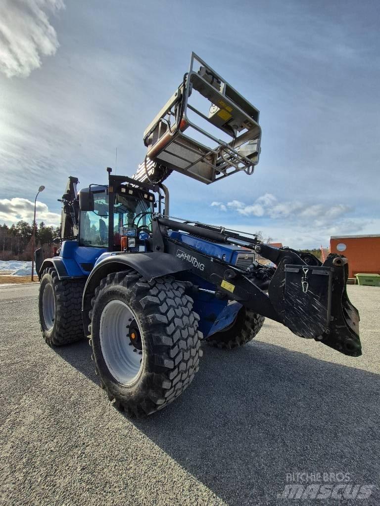 Huddig 1260 B Товарач със заден ексватор