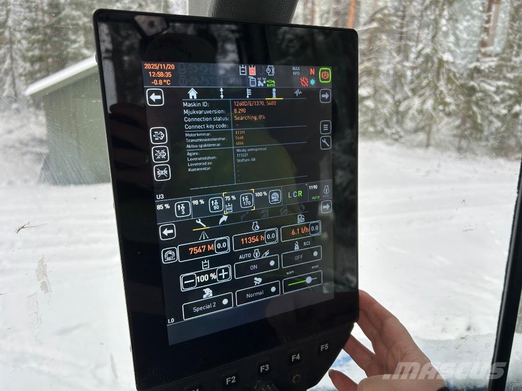 Huddig 1260 D City Товарач със заден ексватор