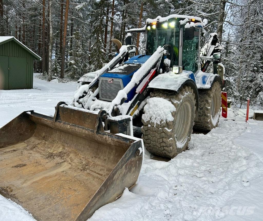 Huddig 1260 D City Товарач със заден ексватор