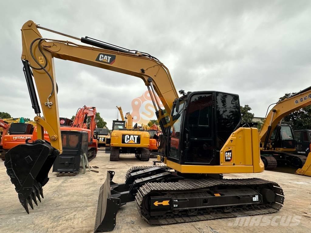 CAT 310 Верижен екскаватор