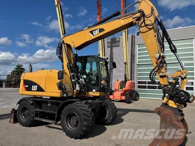 CAT M 313 D Колесни екскаватори