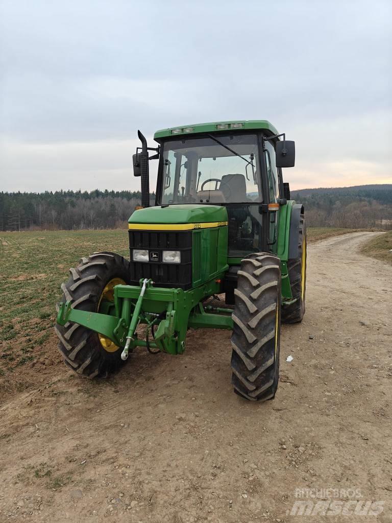John Deere 6100 Трактори